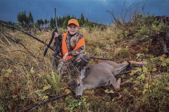 Ryan found this blacktail doe after he hiked a ridgeline along a clear-cut and made the shot – without any guidance from his father.